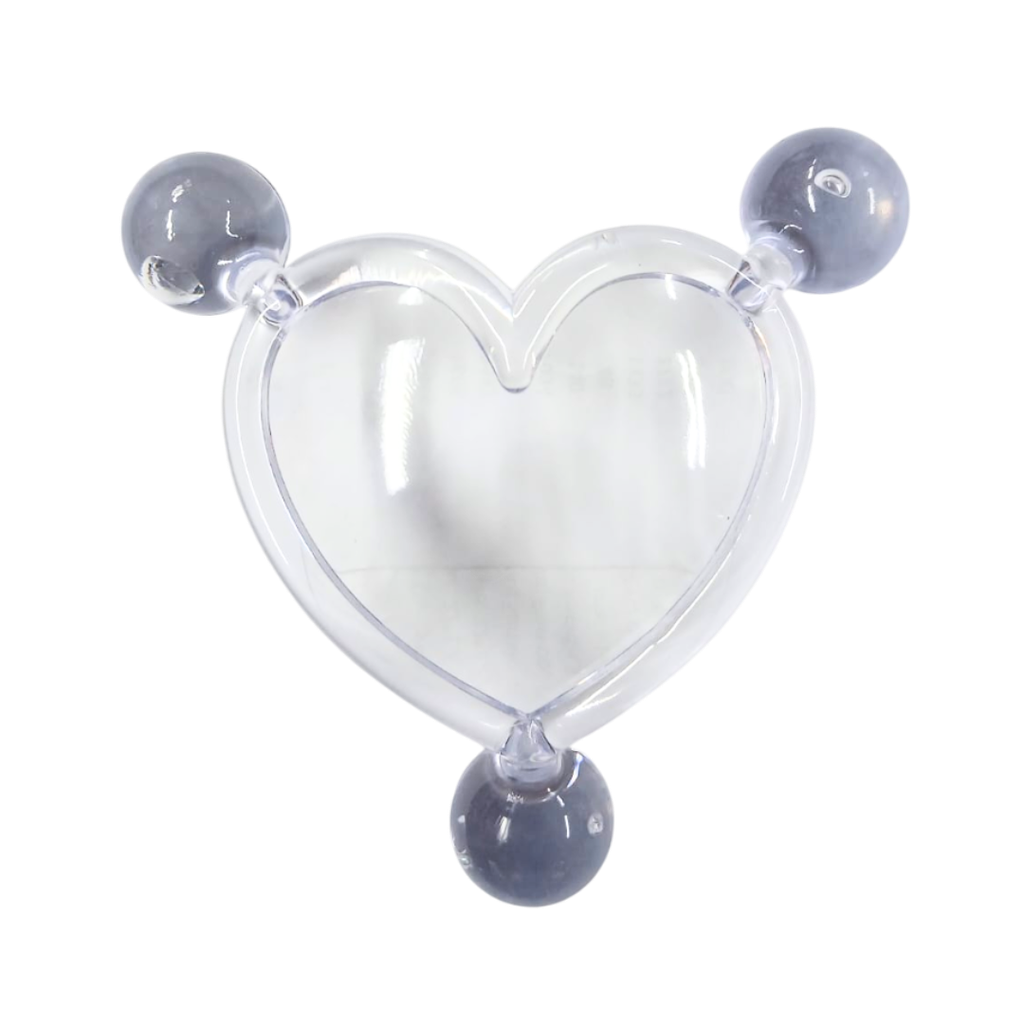 Masajeador forma de corazon transparente